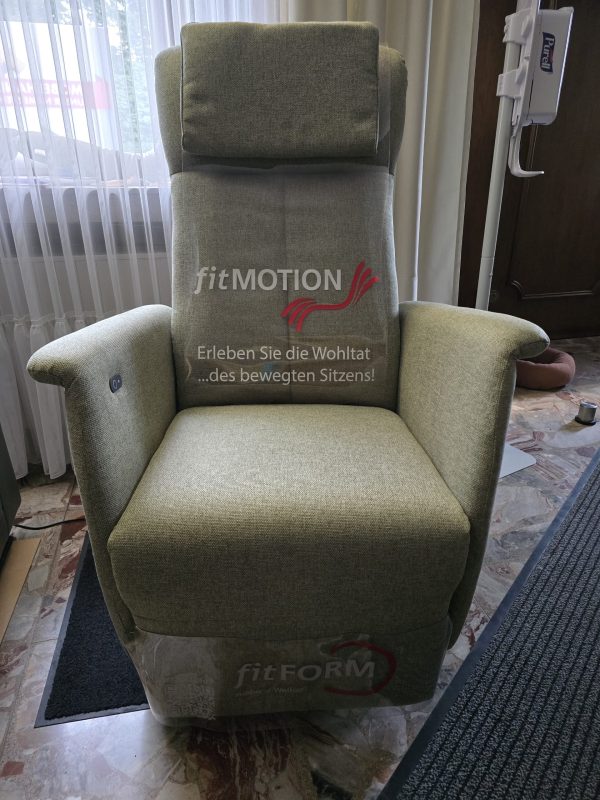 Wellness Sessel grau mit Aufstehfunktion.